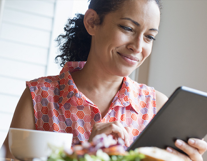 Woman looking at tablet